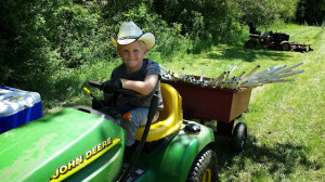 Jake, our 4 year old son, helping out at planting time.